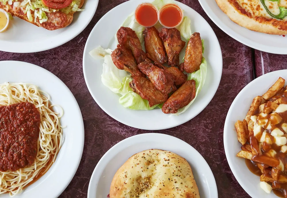 Pizza and wings combo for sharing at New Pizza Factory near Tamarack, Edmonton